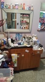 Vintage lighted medicine cabinet and vanity with sink and faucets