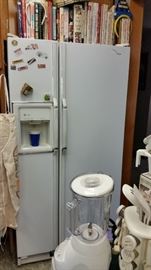 Side by side refrigerator freezer with ice and water in the door $150