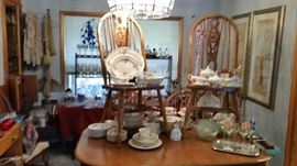 70's era oak trestle table with 2 leaves 50.00 ~ 10 oak dining chairs at $15.00 each