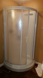 Curved shower stall with faucets 250.00 You remove