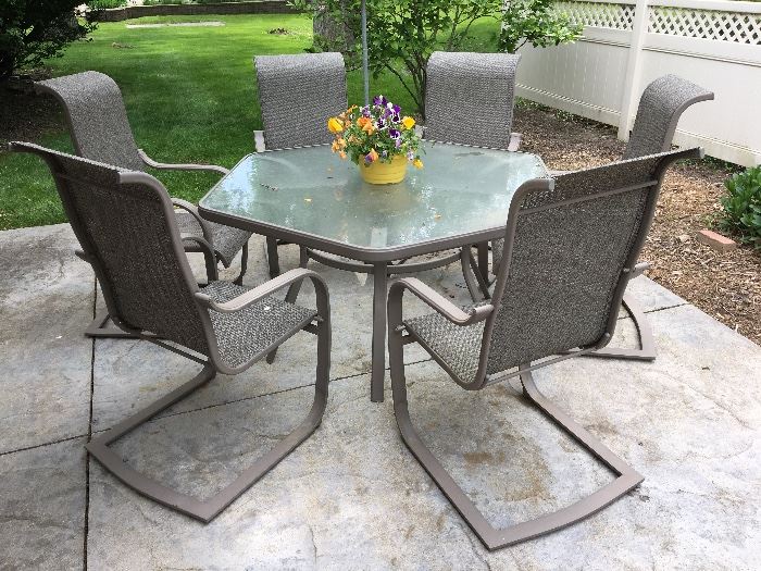 Outdoor Patio w/ 6 chairs and glass table
