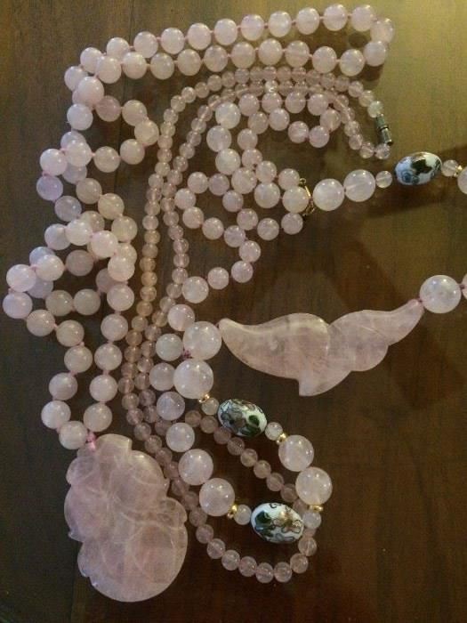 Three (of several) pink quartz necklaces