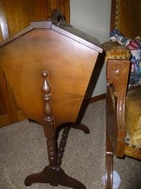 VINTAGE COLONIAL, FREE-STANDING SEWING BOX. IT HAS 2 TOP LIDS THAT OPEN TO REVEAL STORAGE
