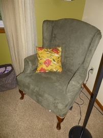 VINTAGE QUEEN ANNE WING BACK CHAIR WITH THE SAGE CHAIR COVER ON IT