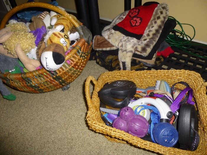 Lots of doggie toys, leashes and blankets