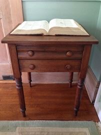 Parlor table. Webster's New International Dictionary 2nd edition, Unabridged sold separately.
