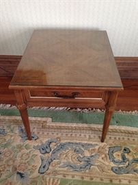 2 glass-top end tables