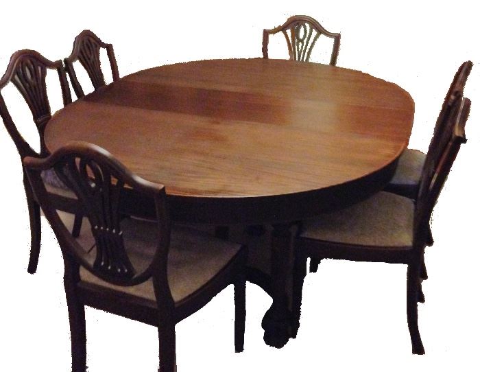 Mahogany table with 3 leaves, 6 chairs, table-top pads, leaf-storage unit.
