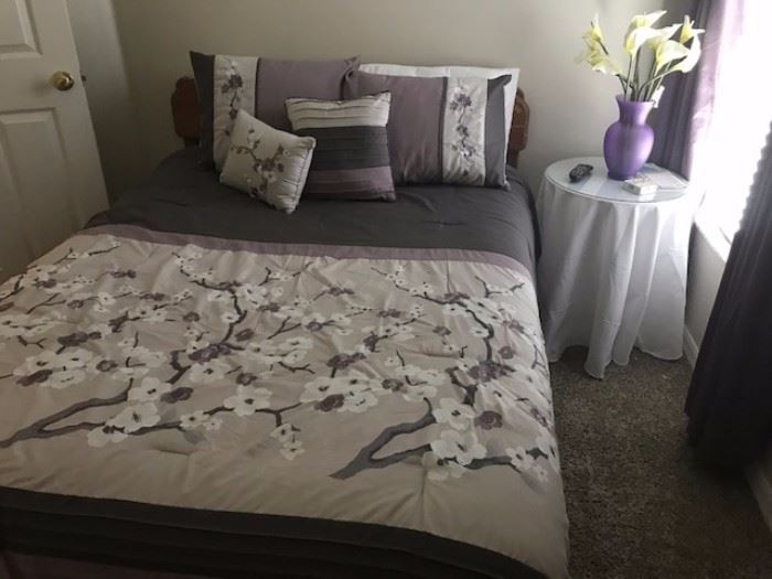 One of two full size bedding sets.  Alos available is the full size bed and mattress and box spring