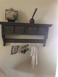 Wall rack with storage drawers