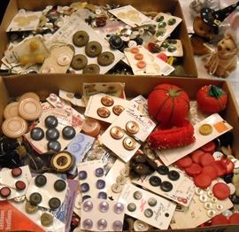 Two boxes filled with vintage buttons