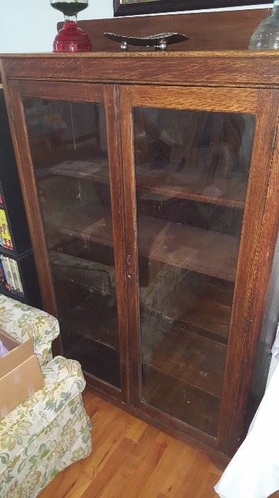 Antique Glass book shelf/cabinet
