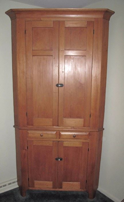 Fine blind door corner cupboard with drawers. Pennsylvania.