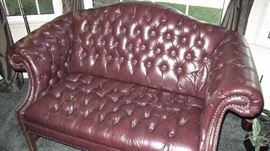 Tufted leather sofa.