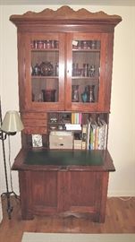 Stepback cupboard with desk. Added scalloped top piece.
