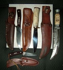 Left to Right: Vintage Schrader-Old Timer hunting knife w Nice leather sheath. Irwin Campbell Hunting knife w leather sheath. Solingen Germany Original Buffalo skinner w death sheath. Bottom-Schrade skinner w leather case