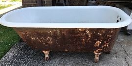 Antique porcelain claw foot tub