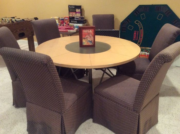 Game table, slipper chairs and assorted board games, plus foldable felt poker tabletop