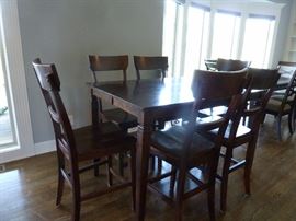 Kitchen table(counter/pub height) 6 chairs and built in leaf