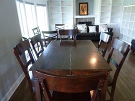 Kitchen table(counter/pub height) 6 chairs and built in leaf