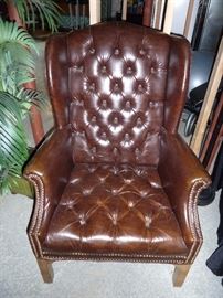 Tufted, nail head trim wing back chair
