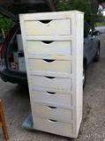Wooden 7 drawer cabinet.  Drawers move nicely.