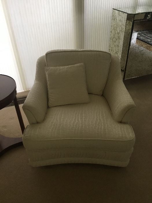 There is a pair of these beautiful chairs.  Quality upholstery. Excellent condition. 