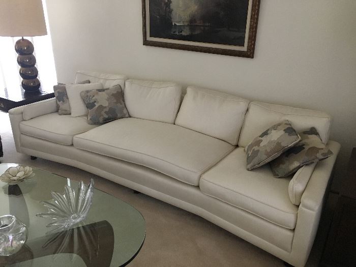 This classic sofa has a slight curve to it. Excellent upholstery in excellent condition. 