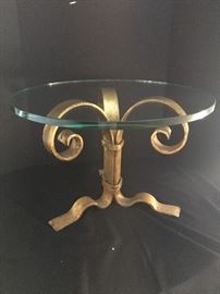 Lovely glass and metal accent table. 
