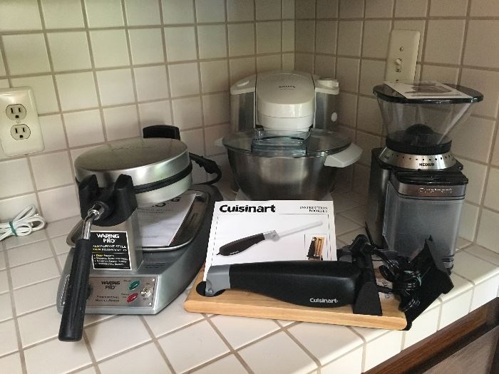 A great collection of kitchen appliances. Cuisinart, Krupps, Waring and others. 