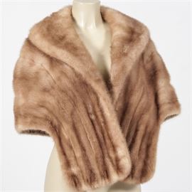 Vintage Juan de Cirota Capelet: A vintage mink capelet by Juan de Cirota. This capelet features brown hued mink fur with a turned out collar, vertical panel design and light brown satin lining. There is one pocket to the interior which is monogrammed BKD. The tag sewn into the stole reads, “Juan de Cirota, Columbus, O., Ft. Lauderdale”.