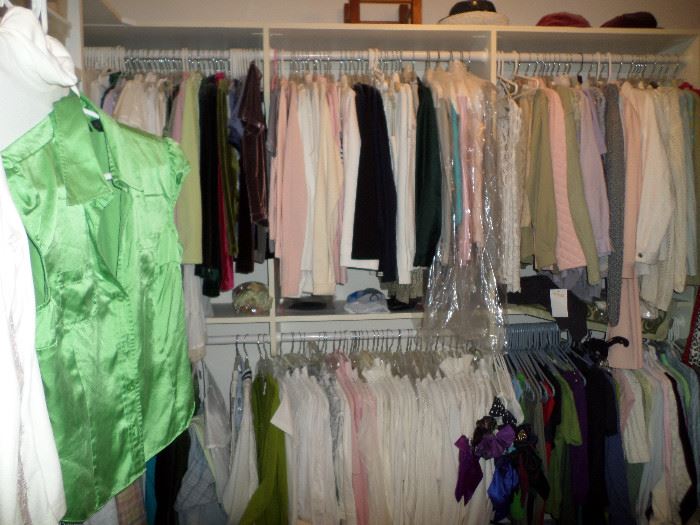 some of the women's clothes in the master bedroom closet - there are several bedrooms & each closet is FULL - plus overflow on department store style racks in the (dry) basement