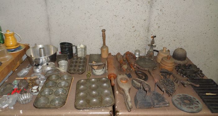 loads of vintage kitchen items as well as antique cast iron, including a Griswold corn bread pan
