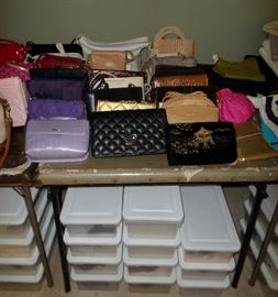 loads of purses & the boxes below the table are all shoes
