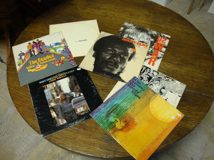 Collectible records including Jimmy Cliff, U2, The Beatles, Larry Norman, The Moody Blues