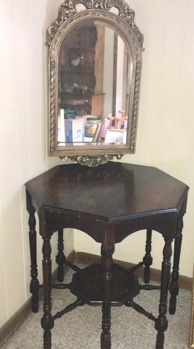 Resin-framed mirror and unique octagonal antique table