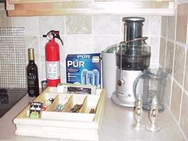Juicer; fire extenguisher; salt and pepper shakers, spreaders; bottle stoppers; water filters; and balsamic vinegar, etc. 