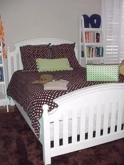 Girl's bed with two matching ladder/book shelves