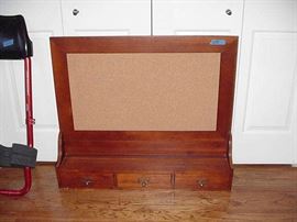 Corkboard with drawers below