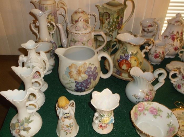 Handpainted teapots, chocolate pots, and pitchers