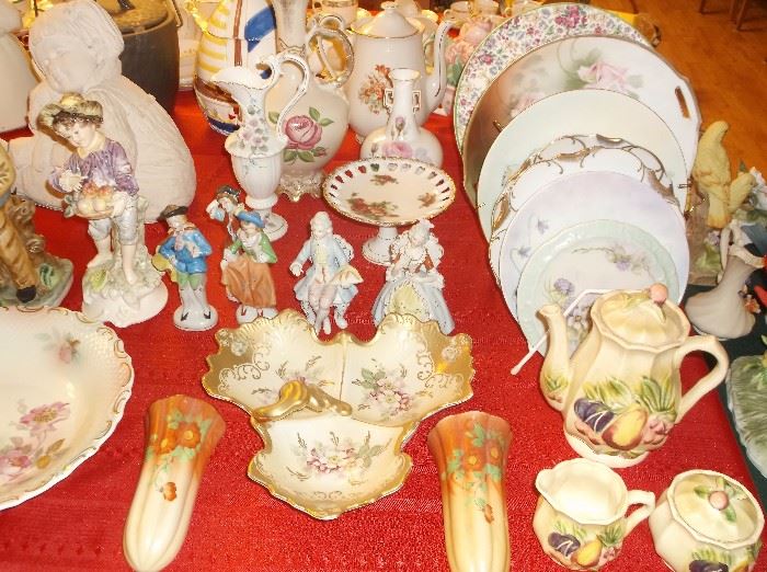 Handpainted porcelain figurines, wall pockets, and plates