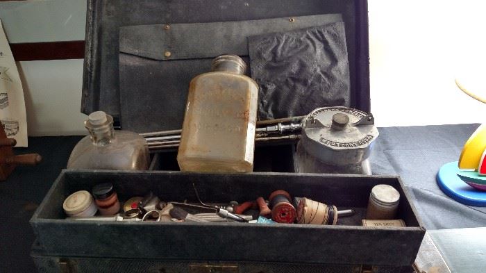 1930s complete embalming kit. Includes 3 bottles and tools. Still contains make-up bottles.
