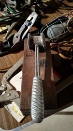 Vintage lead hammer used to loosen wheel nuts on vintage cars