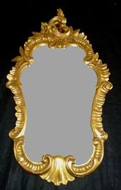 128 - 19th Century Rococo Giltwood Mirror.     H. 31in. , W. 18 in.