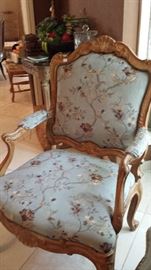 One of a pair of open arm chairs