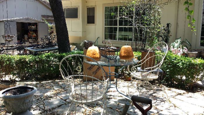There are many outdoor topiary, basket, and other pieces, as well as flower pots and yard art.