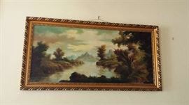 Long oil on canvas of a mountain lake scene is the ideal size for over the sofa or bed.