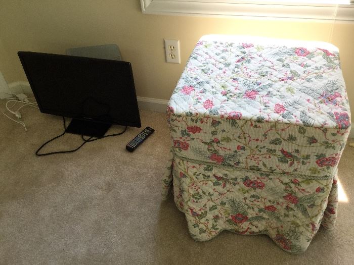 small ottoman and small tv