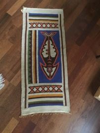 hand woven throw rug. great fish motif