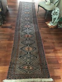 very nice old hand done oriental runner. earth tone colors